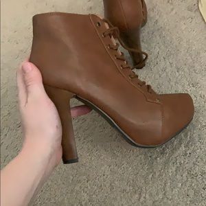Brown leather heeled boots
